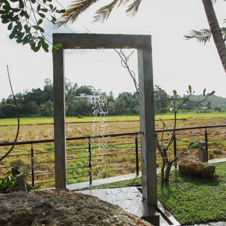 Outdoor shower at Ona Garden Villa