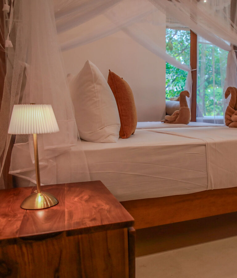 Romantic bed arrangement at Ona Garden Villa
