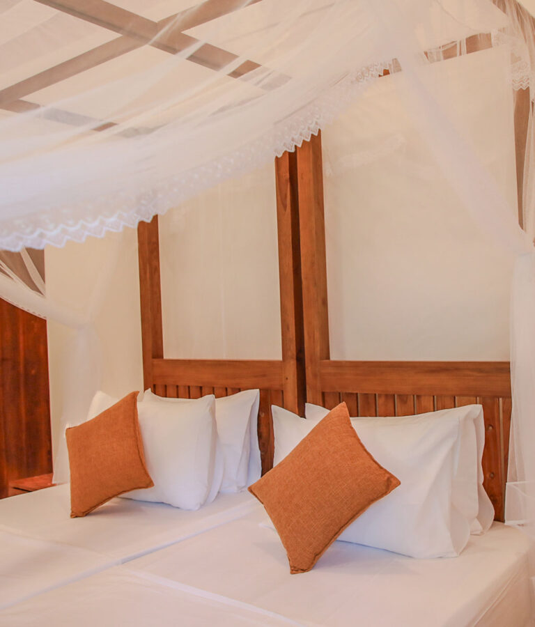 Bed arrangement at Ona Garden Villa