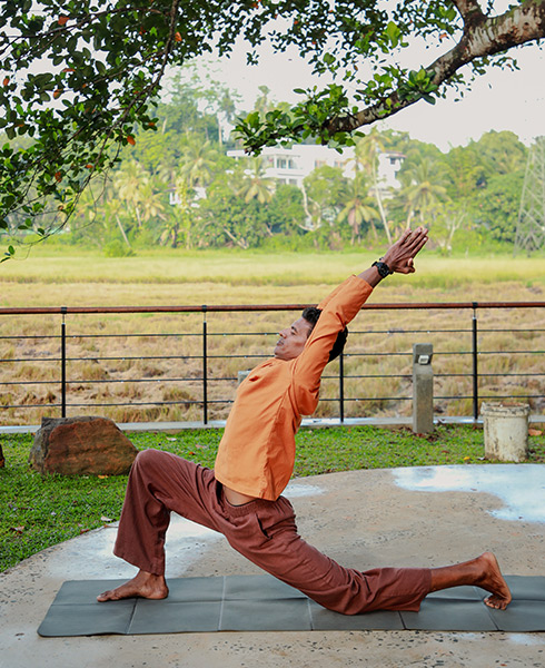 Instructor practicing yoga at Ona Garden Villa