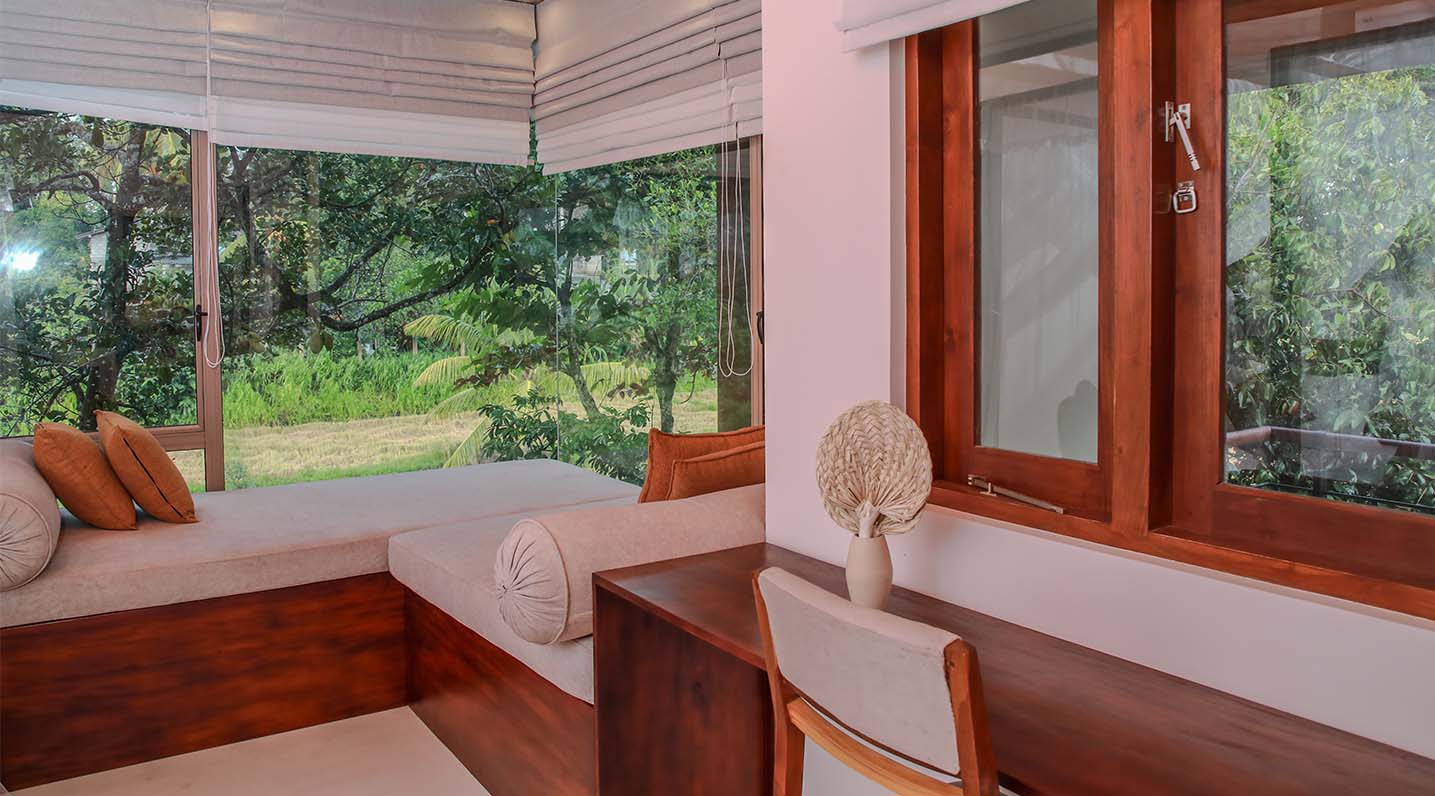 Cinnamon Deluxe room window seat at Ona Garden Villa