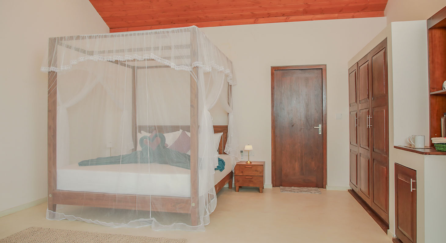 Bed setup of Lotus Suite at Ona Garden Villa