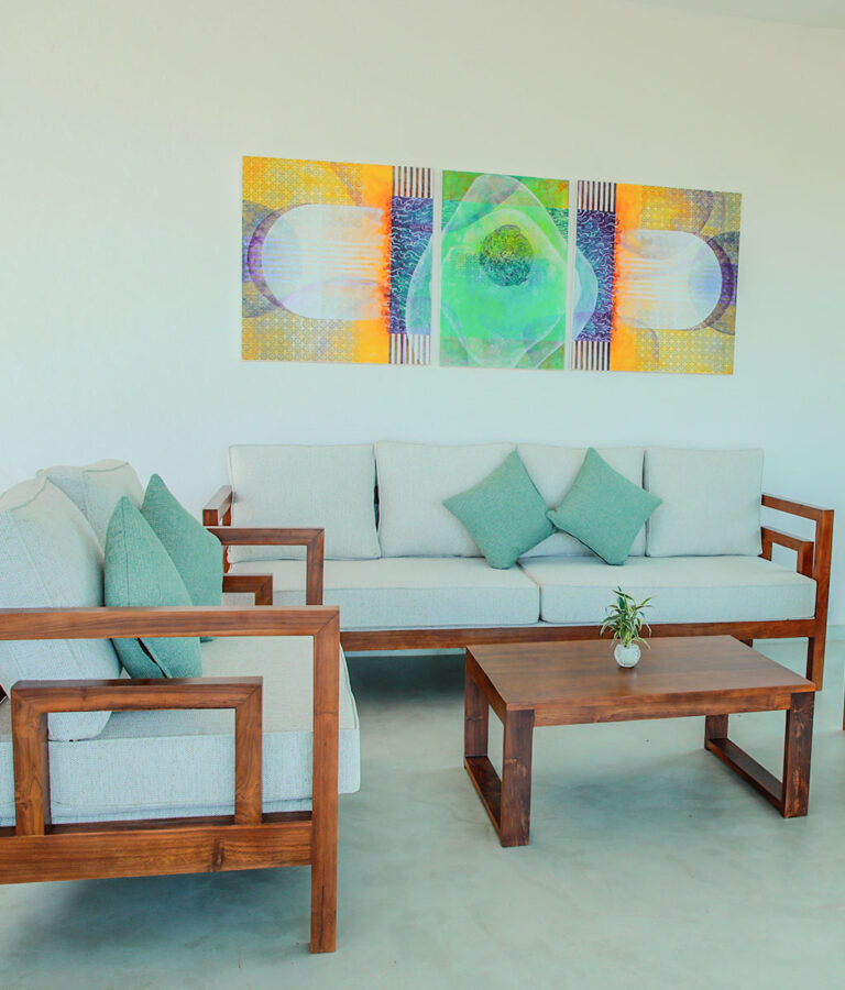 Wall art in a living room at Ona Garden Villa