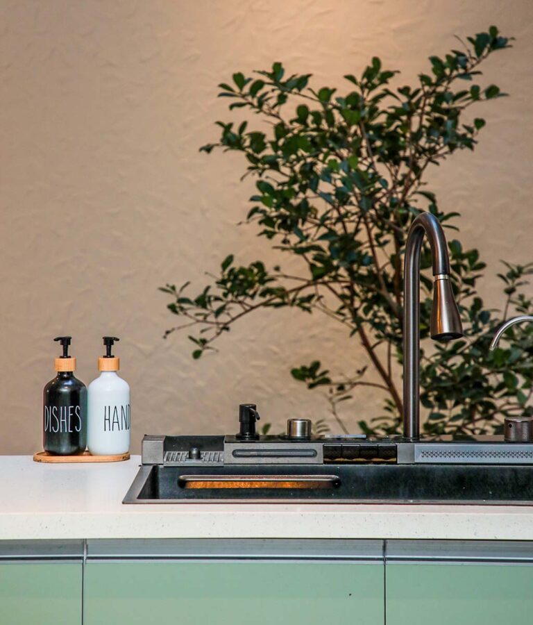 Kitchen sink setup at Ona Garden Villa