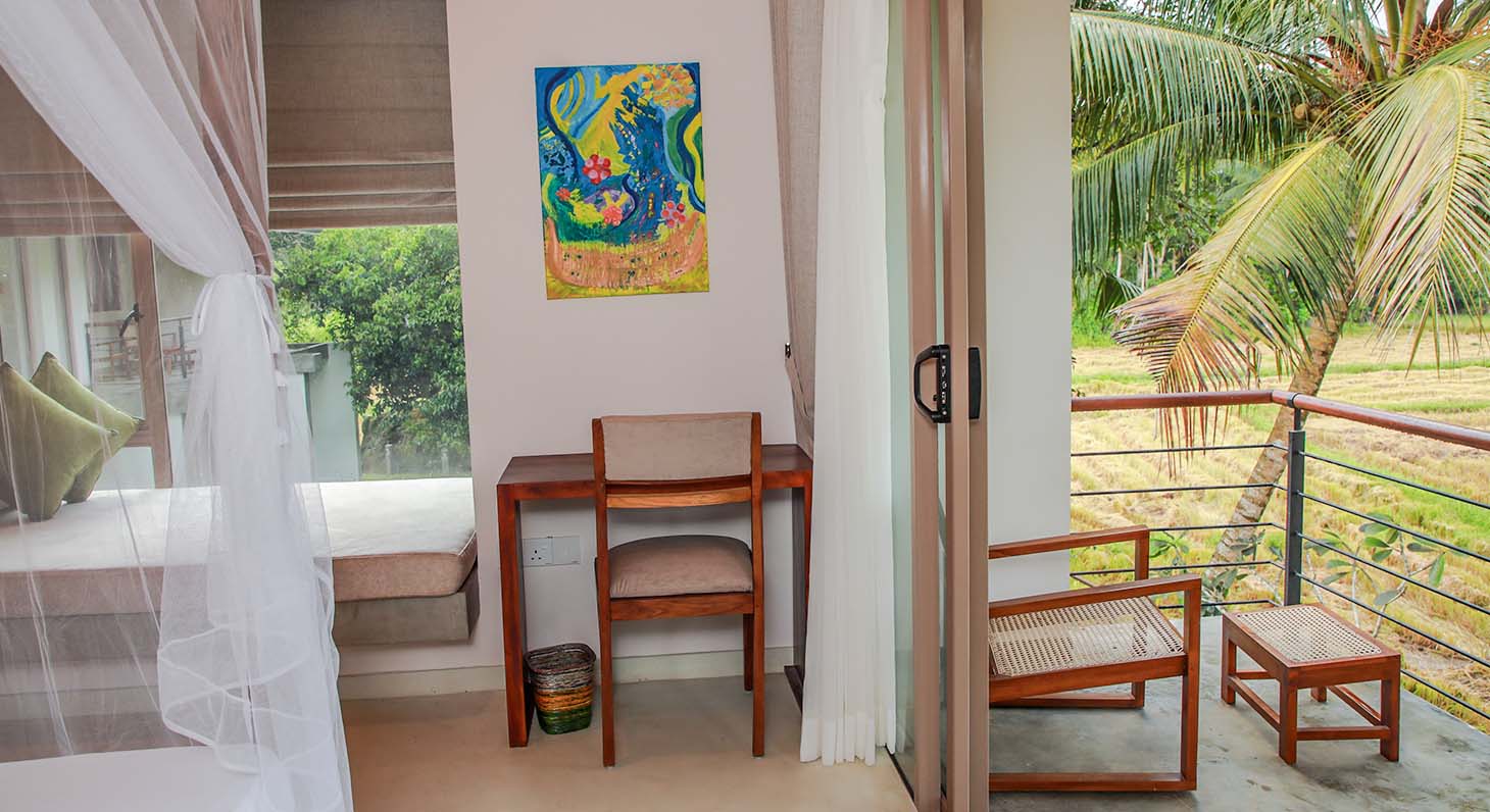 Workdesk setup of Paddy Deluxe room at Ona Garden Villa